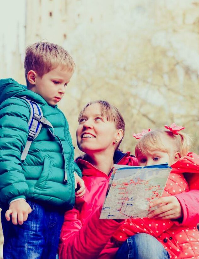 Mom and two children on a scavenger hunt